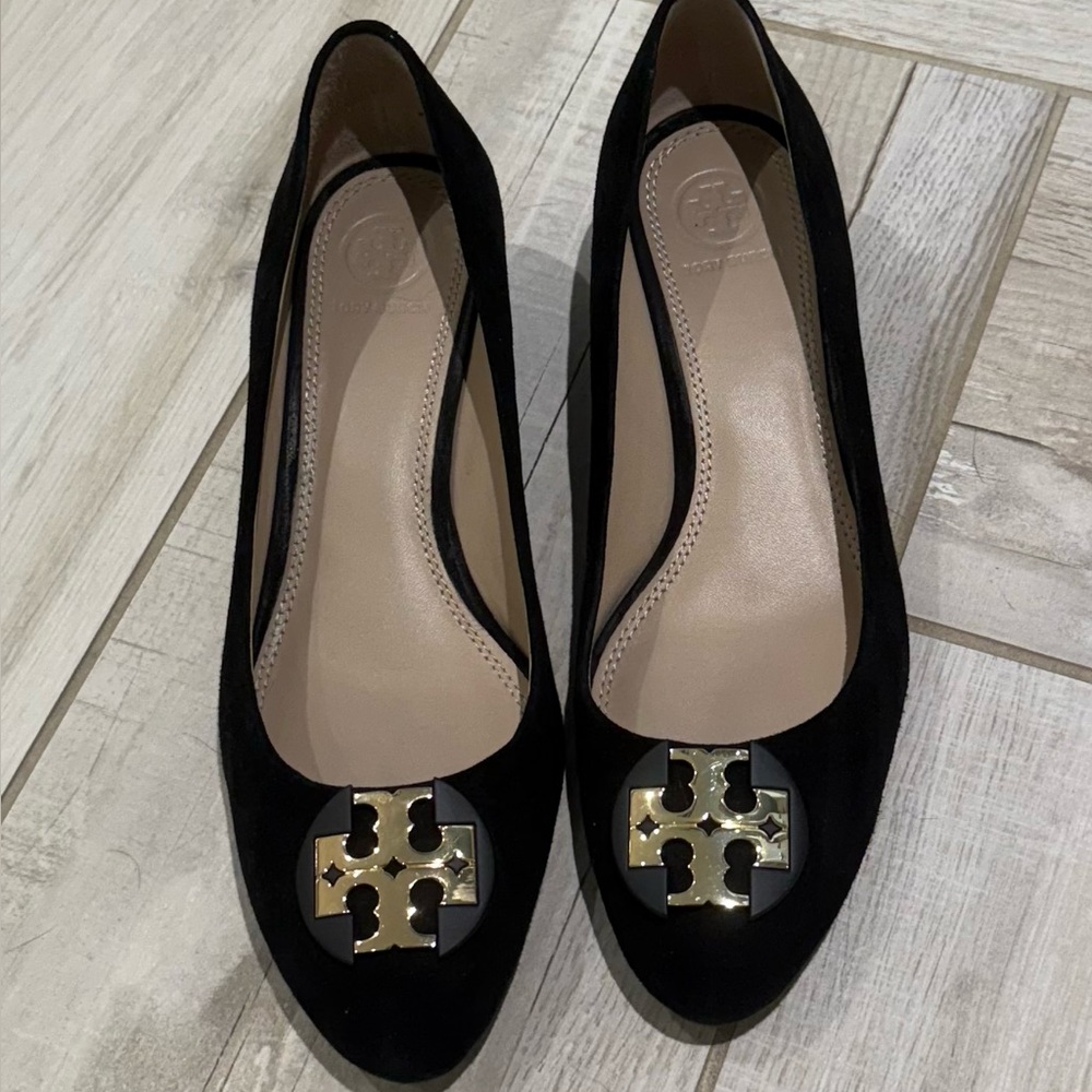 Tory Burch Black and Gold Flats with Logo Medallion